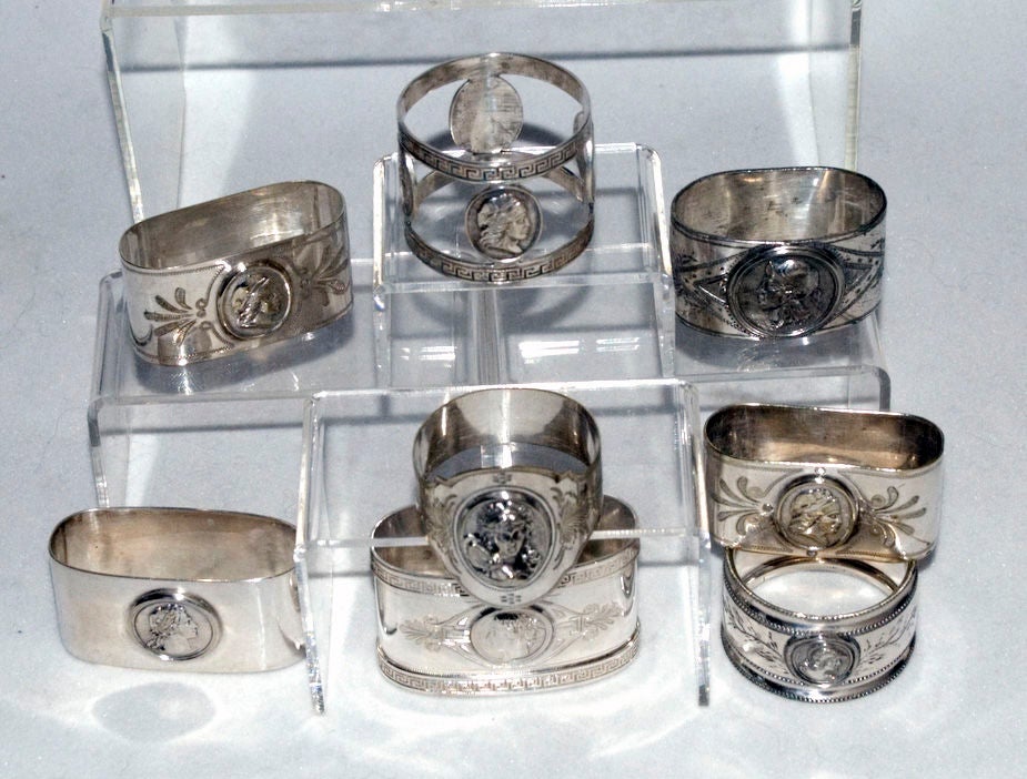 8 Medallion Motif Napkin Rings Coin And Silver Silverplate 1