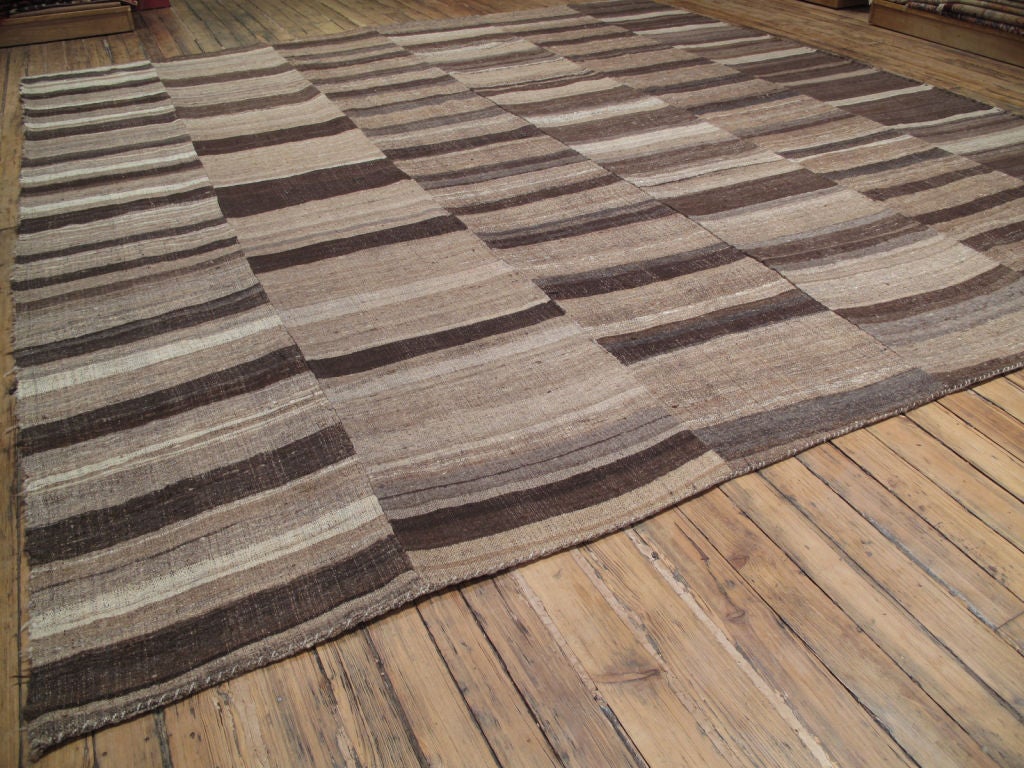 Tribal floor cover woven in six panels. Un-dyed, hand-spun wool and camel hair. Wonderful texture, modern look.