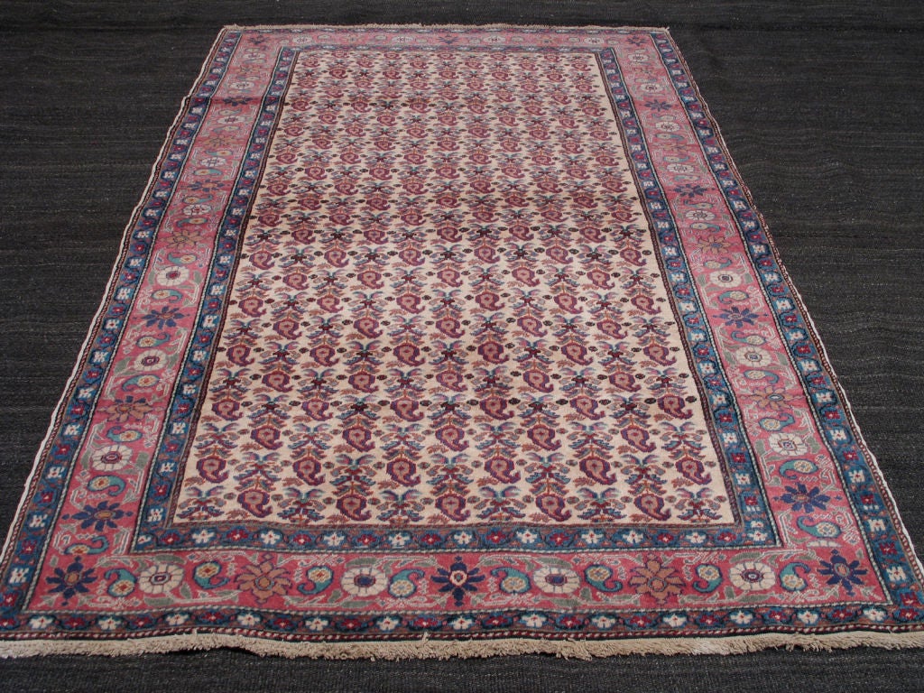 Kayseri rug. Vintage Turkish rug featuring a 19th century Persian design. Rug has lovely color palette.