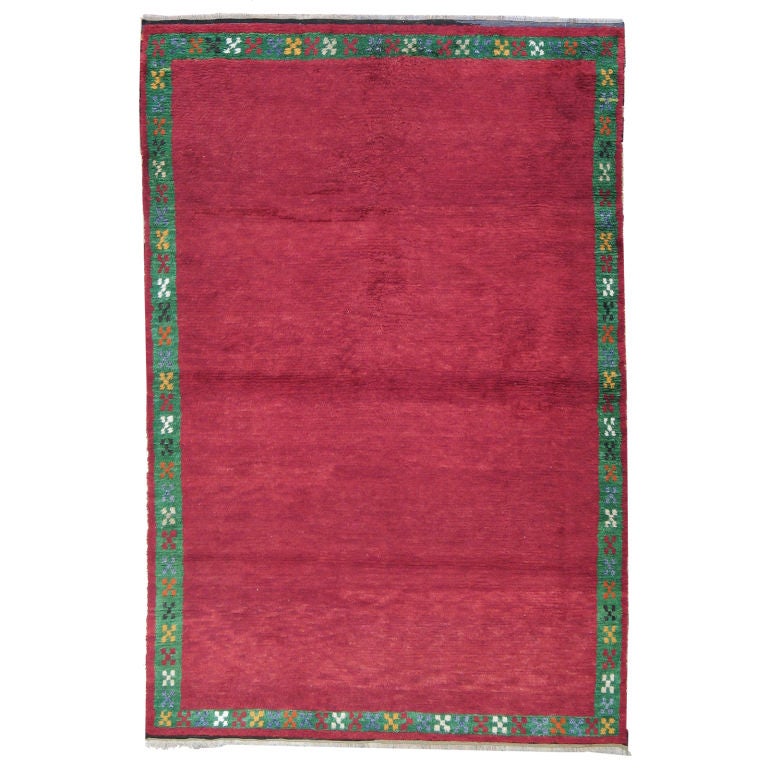 Red Tulu Rug with Green Border