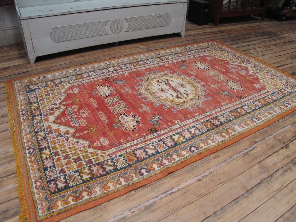 Moroccan rug. Carpets or rugs like these, borrowing motifs from Turkish and other traditions, were popular in Morocco in the early part of the 20th century. This rug is a very nice example in excellent condition.