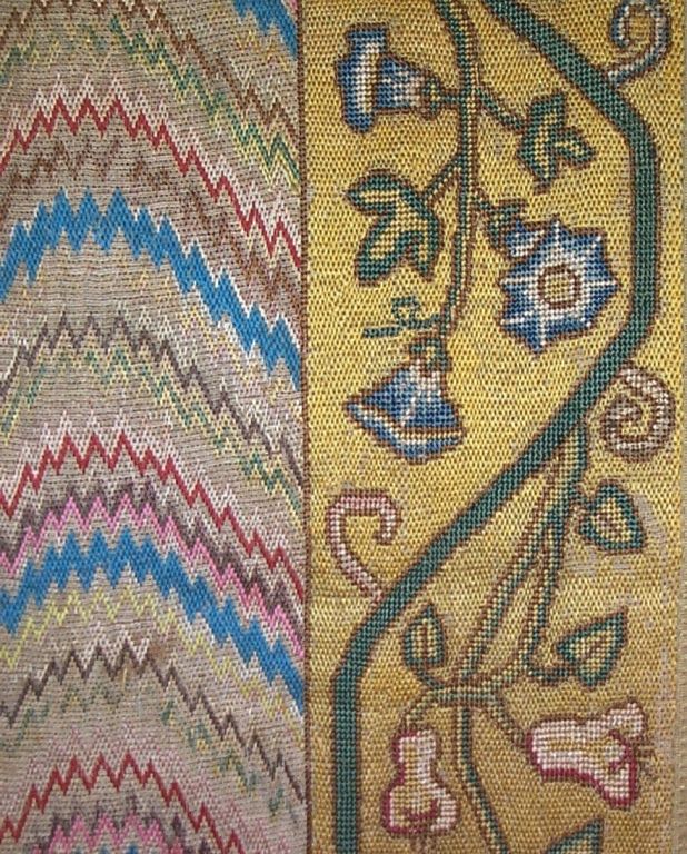 17th century Italian silk bargello (flame stitch) table cover with floral border, the center in shades of pink, blue, red, yellow and green, and the border in a red and green scrolling floral design on a yellow ground