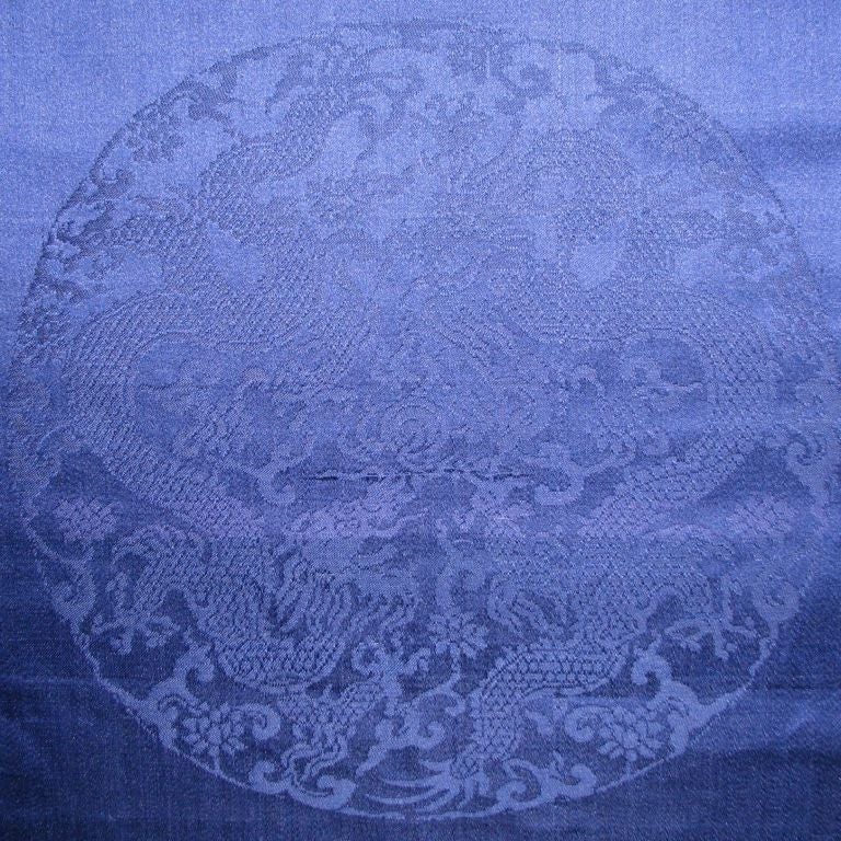 19th Century Chinese (Guangxu period)blue silk with dragon damask roundels.