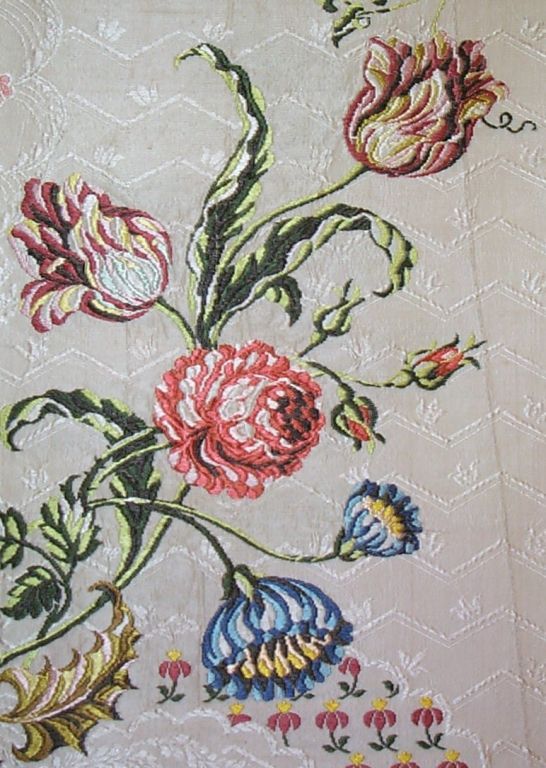 English (Spitalfield's) cream silk brocaded in polychrome silk floral design.
