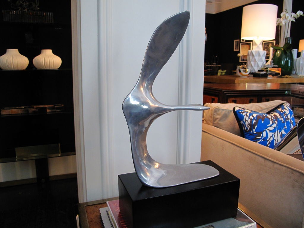 Vintage polished aluminum abstract sculpture on custom base titled 