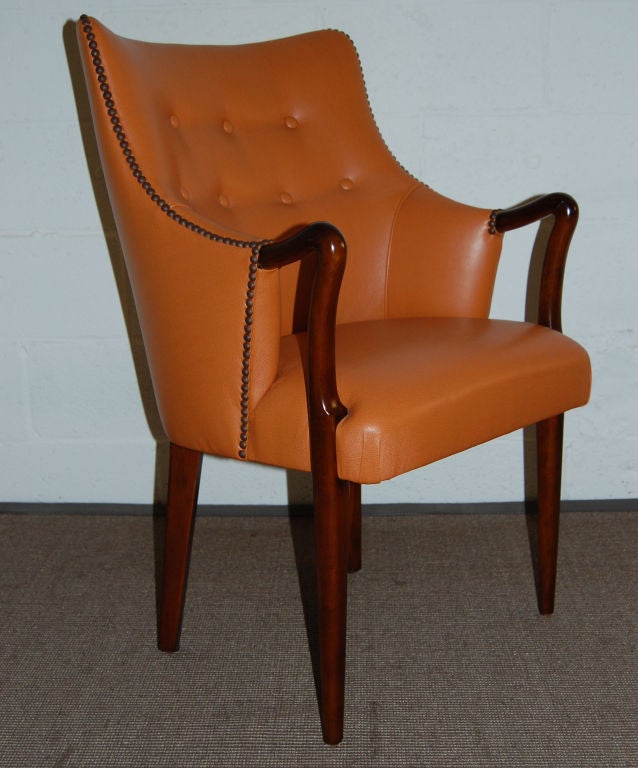 Unusually shaped arm chair new restored and reupholstered in UltraLeather 