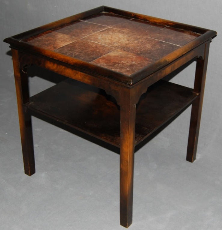 Dark flame birch end or side table with shelf.  Beautifully matched earthenware tile was probably added at a later date.