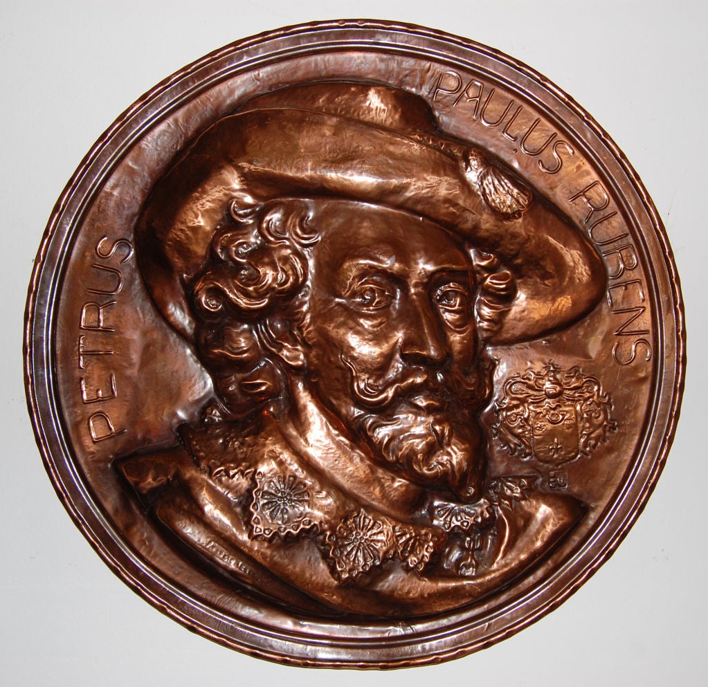 Molded copper rondel plaque of the great Flemish Master Peter Paul Rubens.  Rubens is depicted in a high-relief bust, facing three-quarters right with a broad-brimmed hat.
