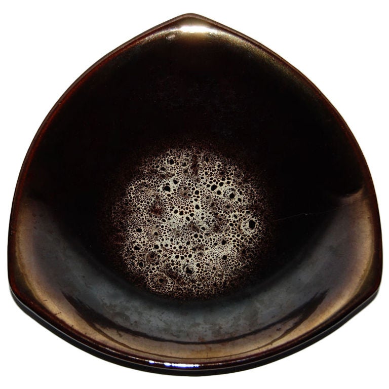 Pre-WWII handsome ceramic plate of high gloss modulated brown glazing with a slight metallic cast - and delicate bubble glazing as a center motif.  Exquisitely created and in beautiful condition.  Marked GERMANY 1914/21 on bottom.<br />
<br />
A