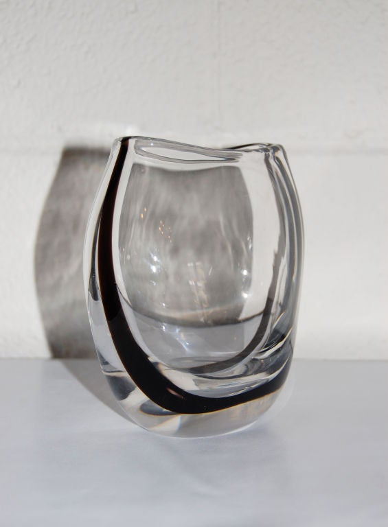 Clear and deep, deep amethyst (almost black) striped cased crystal glass vase hand-formed by renowned Swedish glass artist Vicke Lindstrand.  Etched on base - 
