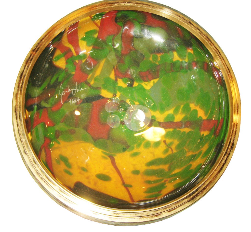 Jack Ink Metal-Mounted Internally Decorated Glass Box of compressed globular form, having metal mounted rims. The underside of the cover is signed and numbered.