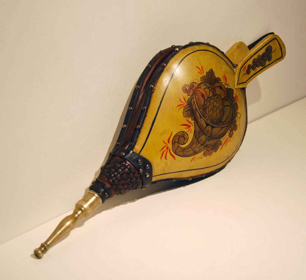 Turtleback bellows with original ochre background and gold painted cornucopia and decoration; American circa 1840.