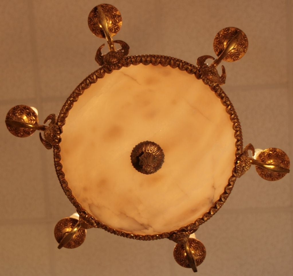 Gorgeous antique French Empire style chandelier with finely cast gilded bronze and alabaster bowl, rewired.