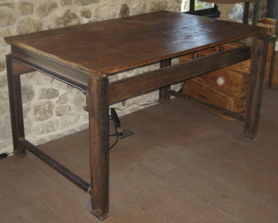 Vintage French industrial iron and wood work table from the 1920-30's with a great patina.