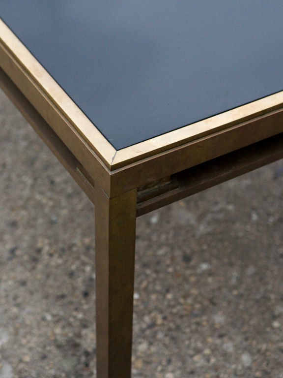 glass and brass dining table