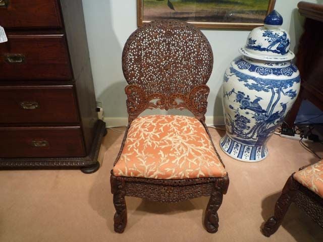 A pair of finely carved Anglo Indian side chairs. Probably Bombay black wood.

fshenemaderantiques check us out.