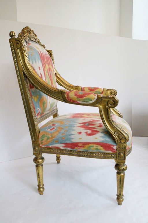Pair of French Louis XVI 24K Gold Leafed Arm Chairs In Excellent Condition For Sale In Los Angeles, CA