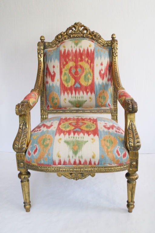 Wood Pair of French Louis XVI 24K Gold Leafed Arm Chairs For Sale