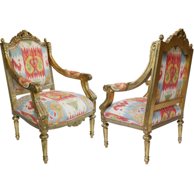 Pair of French Louis XVI 24K Gold Leafed Arm Chairs For Sale