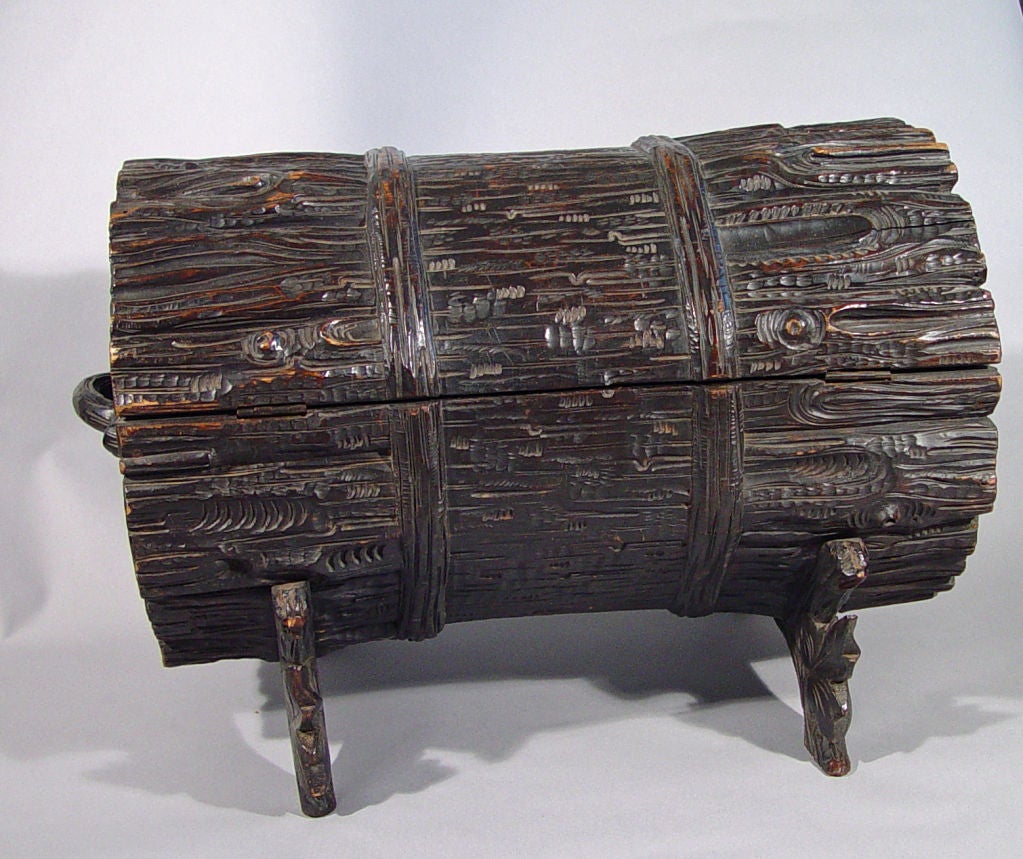 A Black Forest  Storage Box in the Form of a Bundle of Logs.