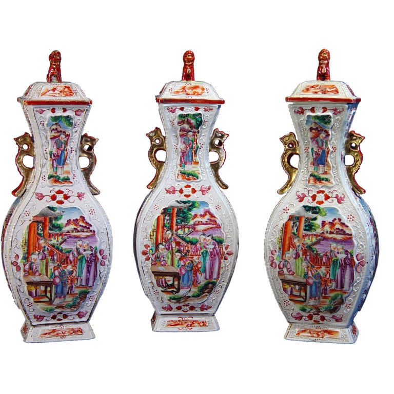A Garniture of Three Chinese Export Famille Rose Vases