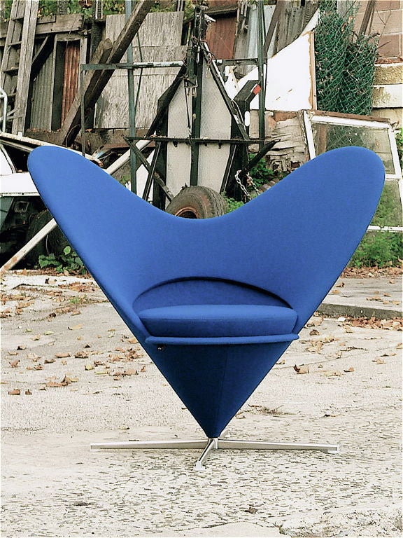 Radical chair design in the form of a blue heart or funnel emanating from a single point at the center of its cross base.<br />
Verner Panton classic design for Plus-linje in the late fifties and early sixties reissued with permission of the estate
