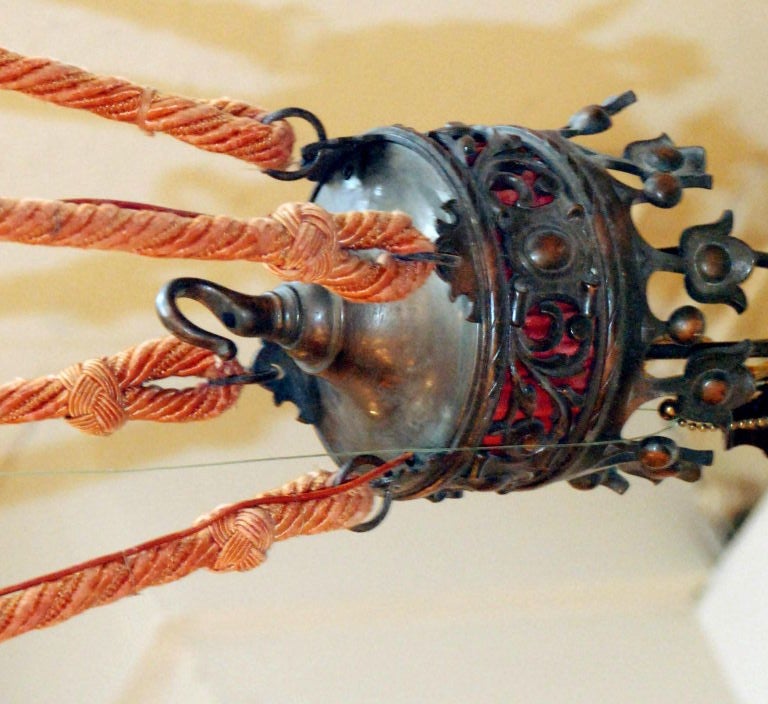 Antique French copper and bronze chandelier, Renaissance style, original patina and original silk cording.