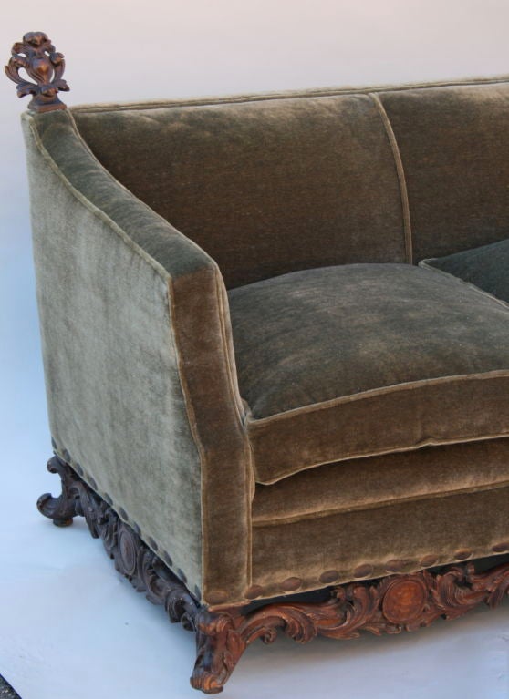 Elegant 1920's couch with newly upholstered in a luxurious, soft mohair and deep (24