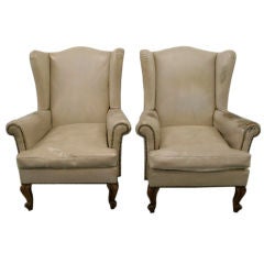 A beautiful pair of  bergere leather Italian armchairs