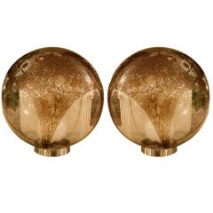 A pair of early 60s globe blown glass table lamps