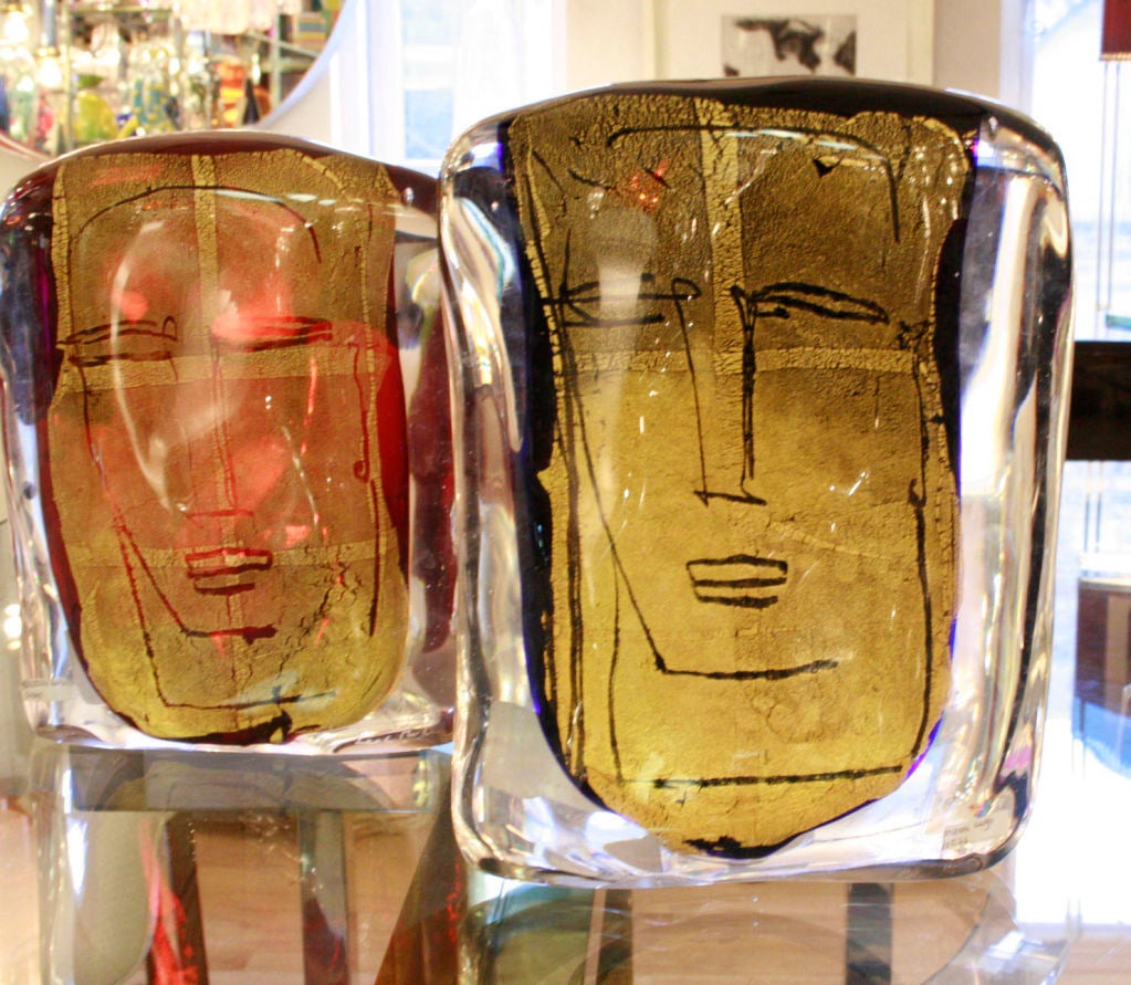 Two unique blown glass block sculptures with gold inclusions each one representing a scketched male face from the series<br />
BEATUS VIR by artist Luigi Benzoni<br />
priced individually