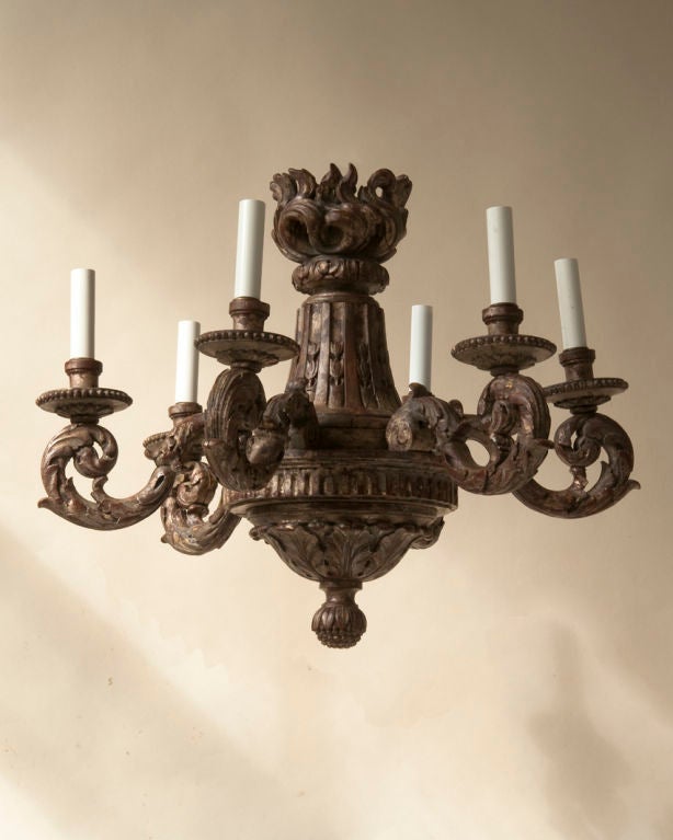 A Louis XVI style silver leaf carved wood six-light chandelier, French 20th century wired for electricity

Measures: Diameter 23