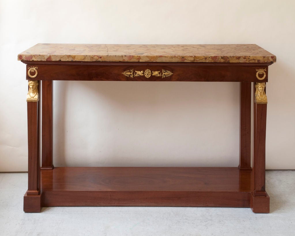 A Fine Empire period mahogany console , breche d’alep marble top
