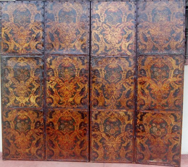Very fine Spanish polychromed leather screen. Composed of 17th Century leather wall panels. SIlver leaf, gilded.