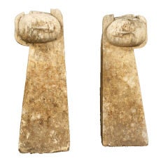 PAIR OF ASIAN SCULPTURES OF ARMS AND HEADS