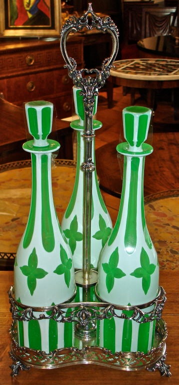 Large Overlay Glass Cruet or Decanter Set in original Sheffield Holder<br />
Size of bottles is 14