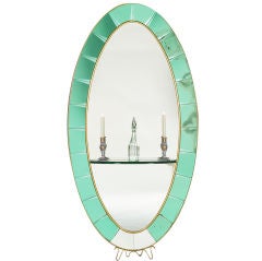 A Cristalart Oval Mirror Console