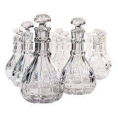 A Set Of Sixteen 19th Century Glass Decanters