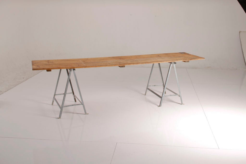 this is one of the best tables i have found. the scale of it is tremendous and the blending of steel legs and the fabulous wood top is wonderful. <br />
<br />
photos john granen