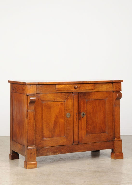 An Empire period walnut buffet from France c. 1810
