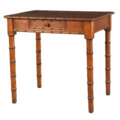 Antique A dark pine side table from France c. 1890