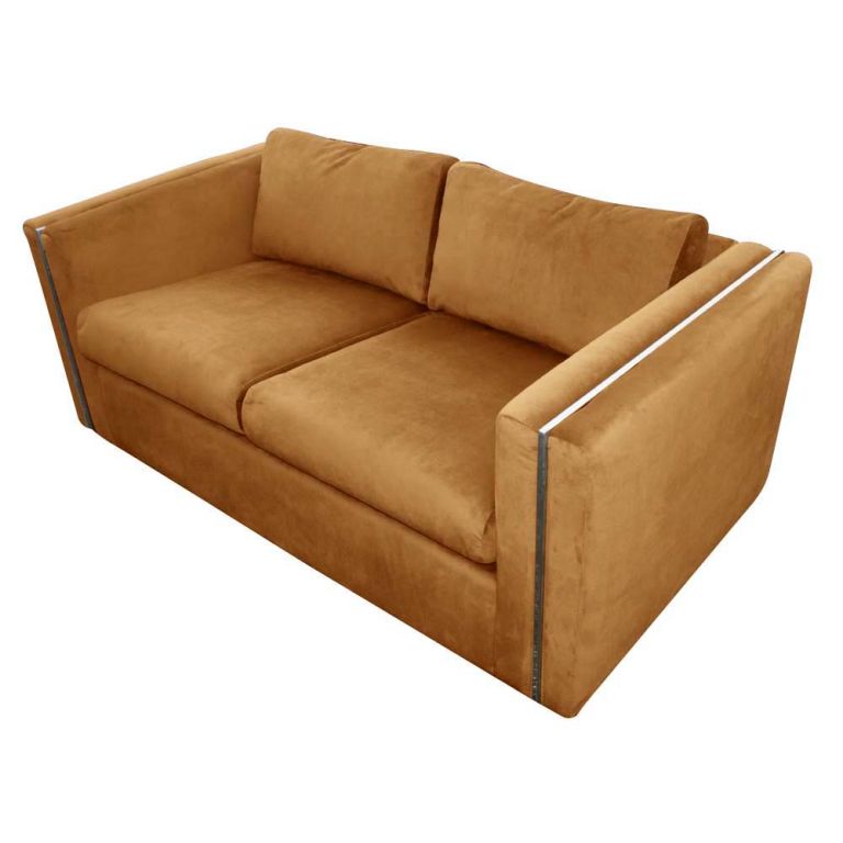 A mid century modern two seat sofa designed by Milo Baughman for Thayer Coggin.  Newly upholstered in medium brown velvet with chrome accents and four detachable cushions.