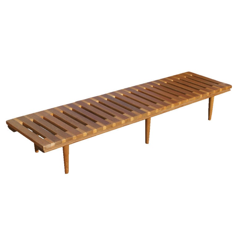 A mid century modern bench designed by John Keal for Brown Saltman of California which could also be used as a coffee table.  Mahogany and maple two-tone constuction.  Tapering legs.  The cushion is a new leather replacement for the original one.