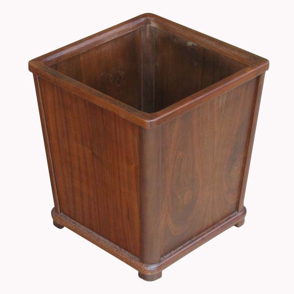 A vintage mid century modern waste basket featuring solid walnut construction with beautiful graining.  Multiple examples are available.