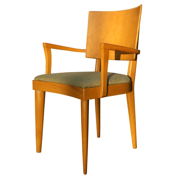 A set of eight Heywood Wakefield dining chairs consisting of two armchairs and six side chairs.  The chairs are model C-155 produced 1947-1950. The chairs are available as a set with a Heywood Wakefield model 179G dining table.  The set is listed