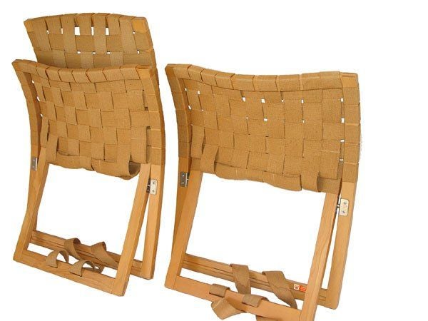 A Mid-Century Modern folding lounge chair and ottoman designed by Ingmar Relling for Westnofa of Norway. Birch frame with beige webbing.  