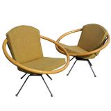 Pair Of Rattan Swivel Lounge Chairs In The Manner Of Paul Frankl
