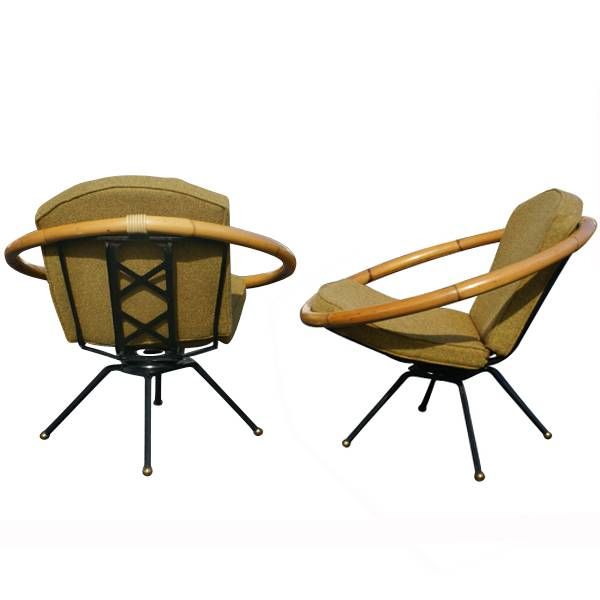 Lounge chair from Ritts' Tropitan line made in the 1940's and reminiscent of the style of Paul Frankl.  Bamboo and iron frame on a swivel base with mustard brown cushions.  As shown in the last image, we also have a matching table available on