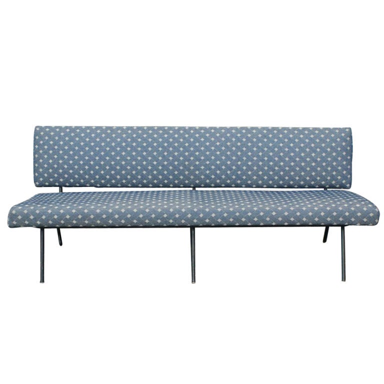 A mid century modern sofa designed by Florence Knoll for Knoll.  In production from 1954-68, the simple lines and black tubular frame would complement any setting.   