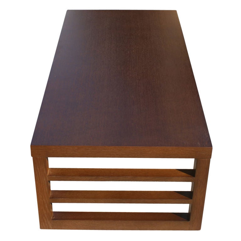 A Mid-Century Modern coffee table made by the Red Lion Table Company. A simple and elegant design in combed oak.